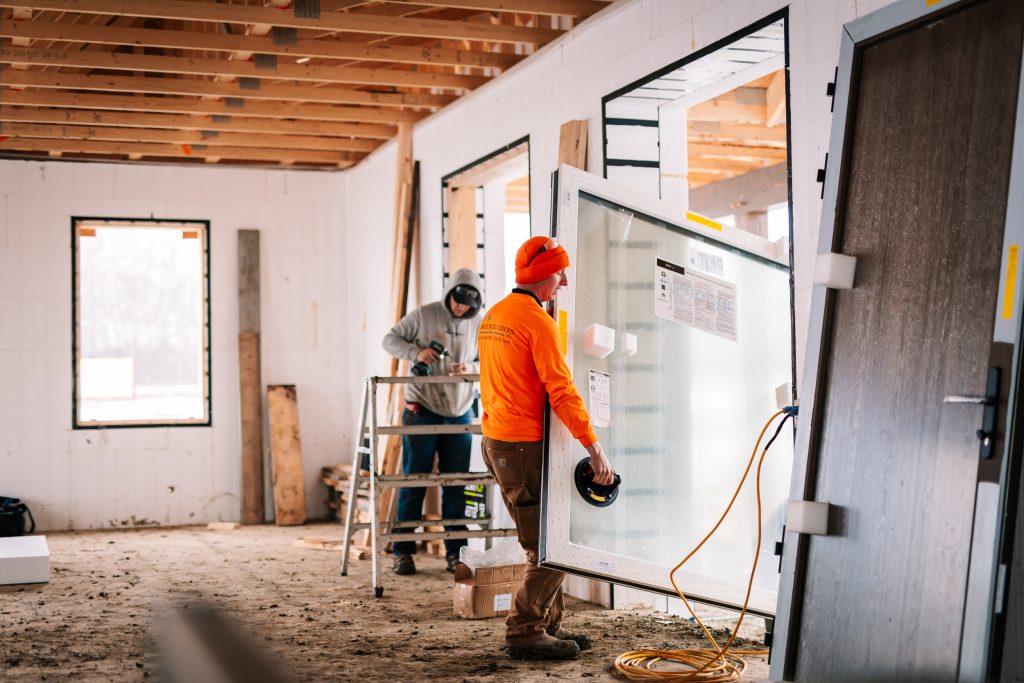 Passive House–certified windows and doors installed within the ICF wall assembly, with insulation and air-sealing details designed to maintain the performance of the enclosure.